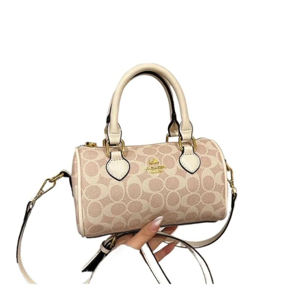 Bolso Mini Barrel Monograma – Elegancia y Estilo Casual